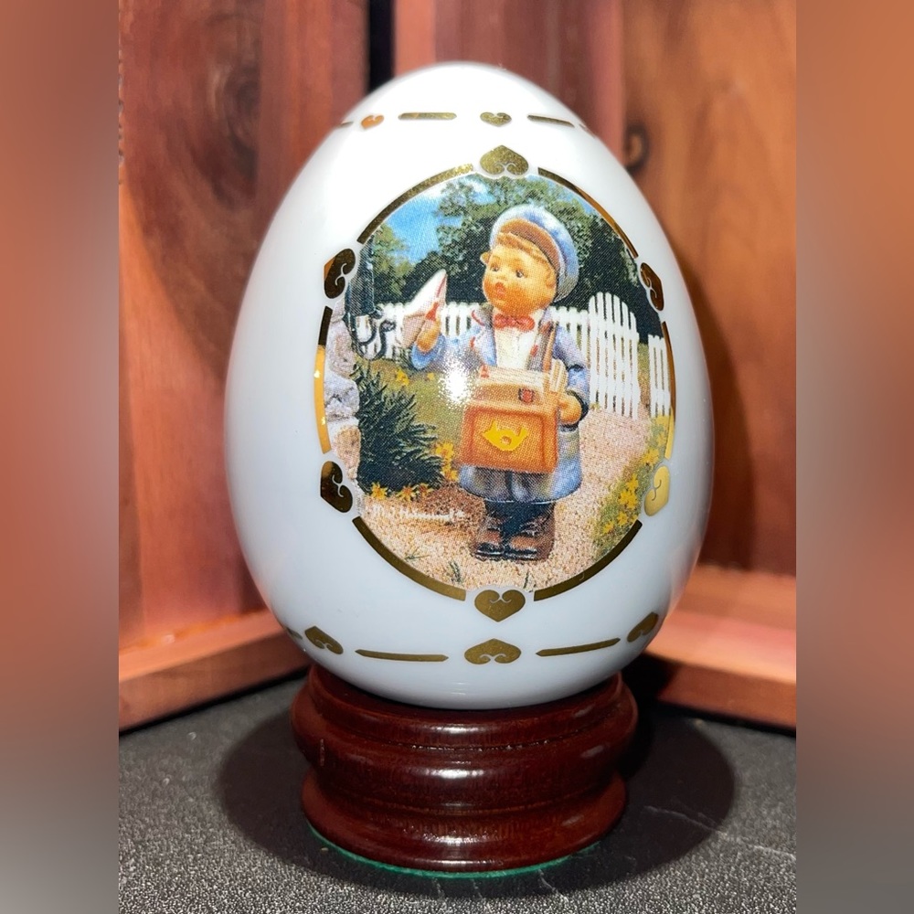 M.J Hummel Danbury Mint The Postman Egg with wooden base